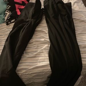 Multiple black pants